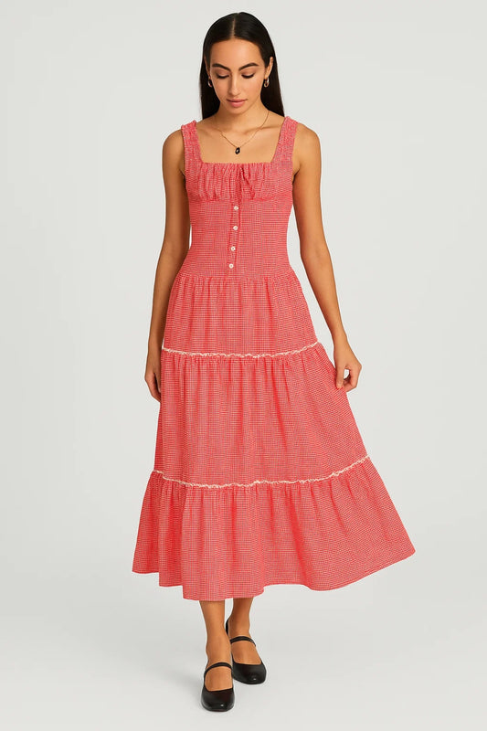 Abito midi a quadretti con balze e bottoncini frontali