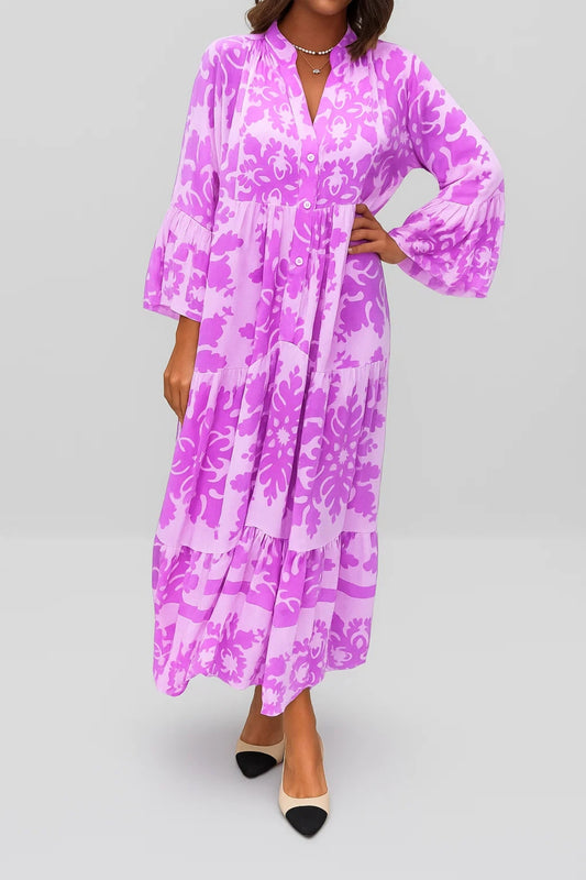 Abito lungo con stampa floreale e maniche a campana