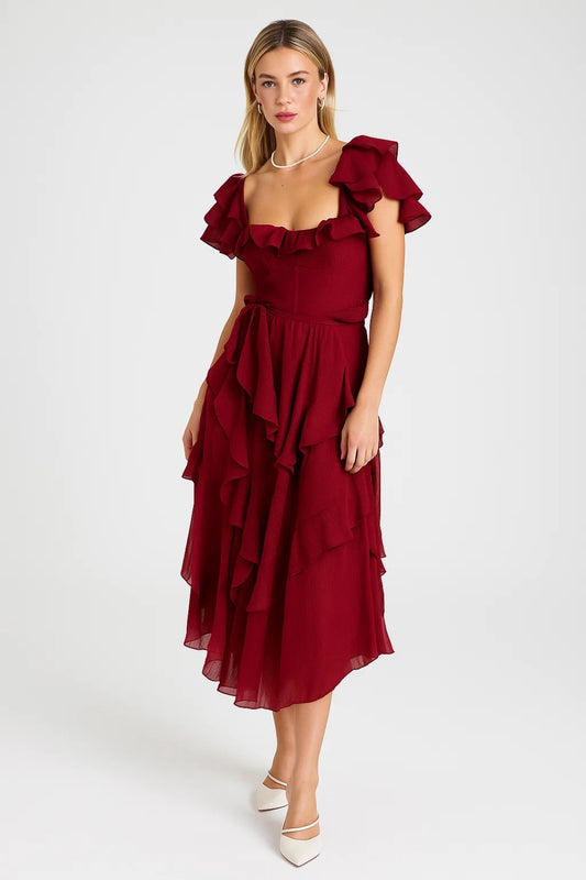 Abito midi bordeaux con balze e scollo a cuore