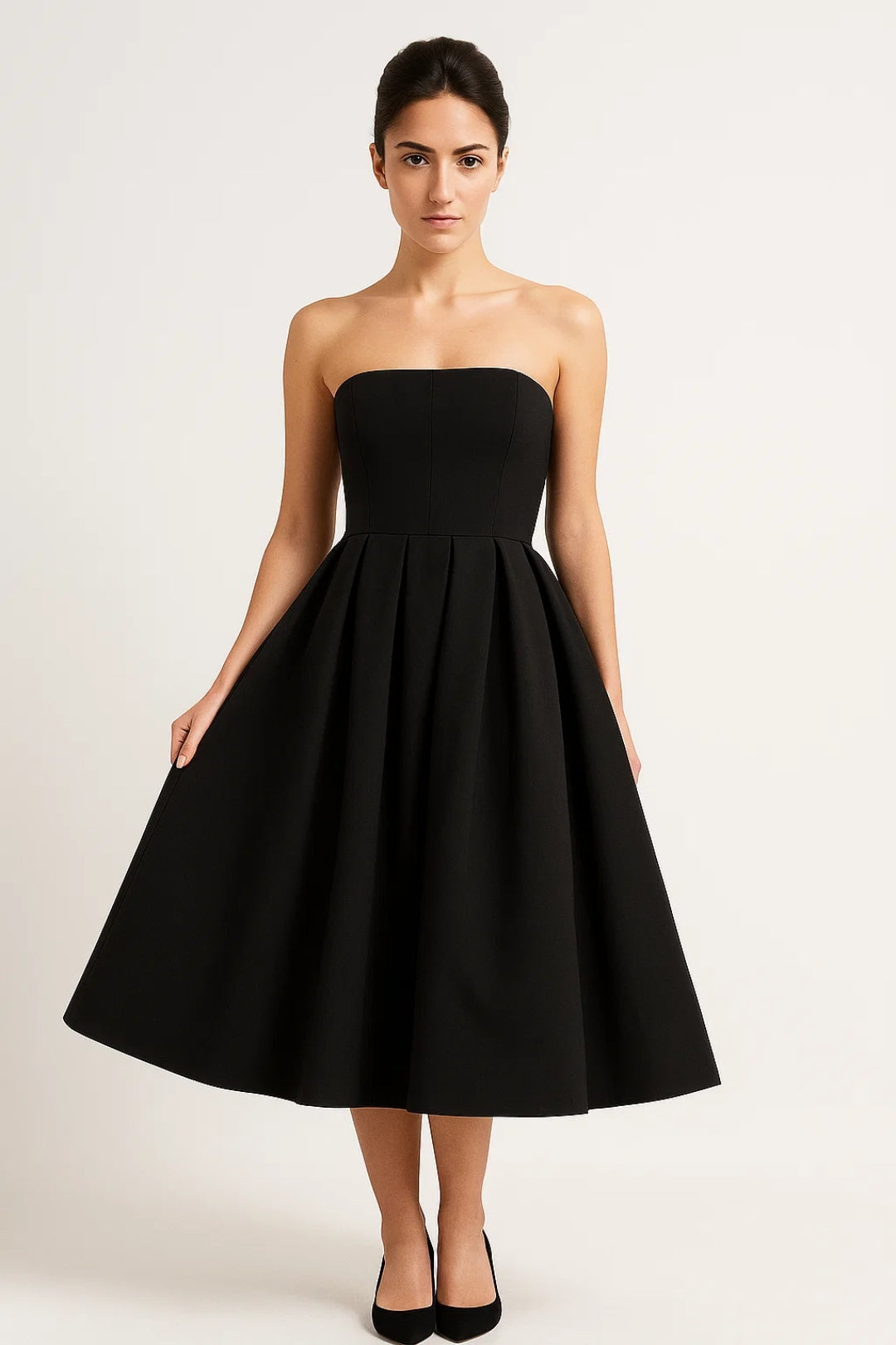 Abito midi elegante senza spalline con gonna a pieghe