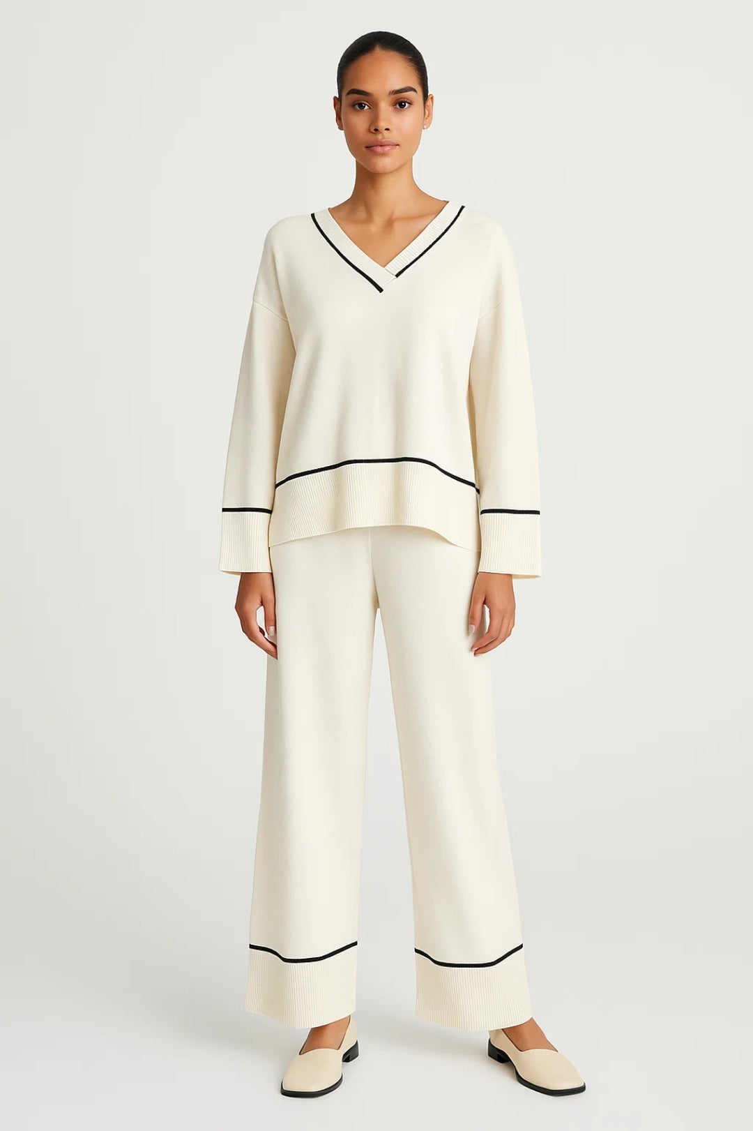 Completo coordinato con maglia a V e pantaloni ampi