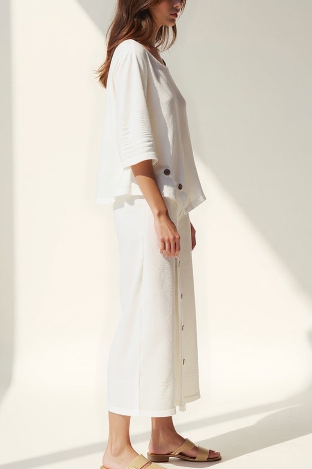 Completo due pezzi con bottoni decorativi | Maglia a maniche 3/4 e pantaloni culotte