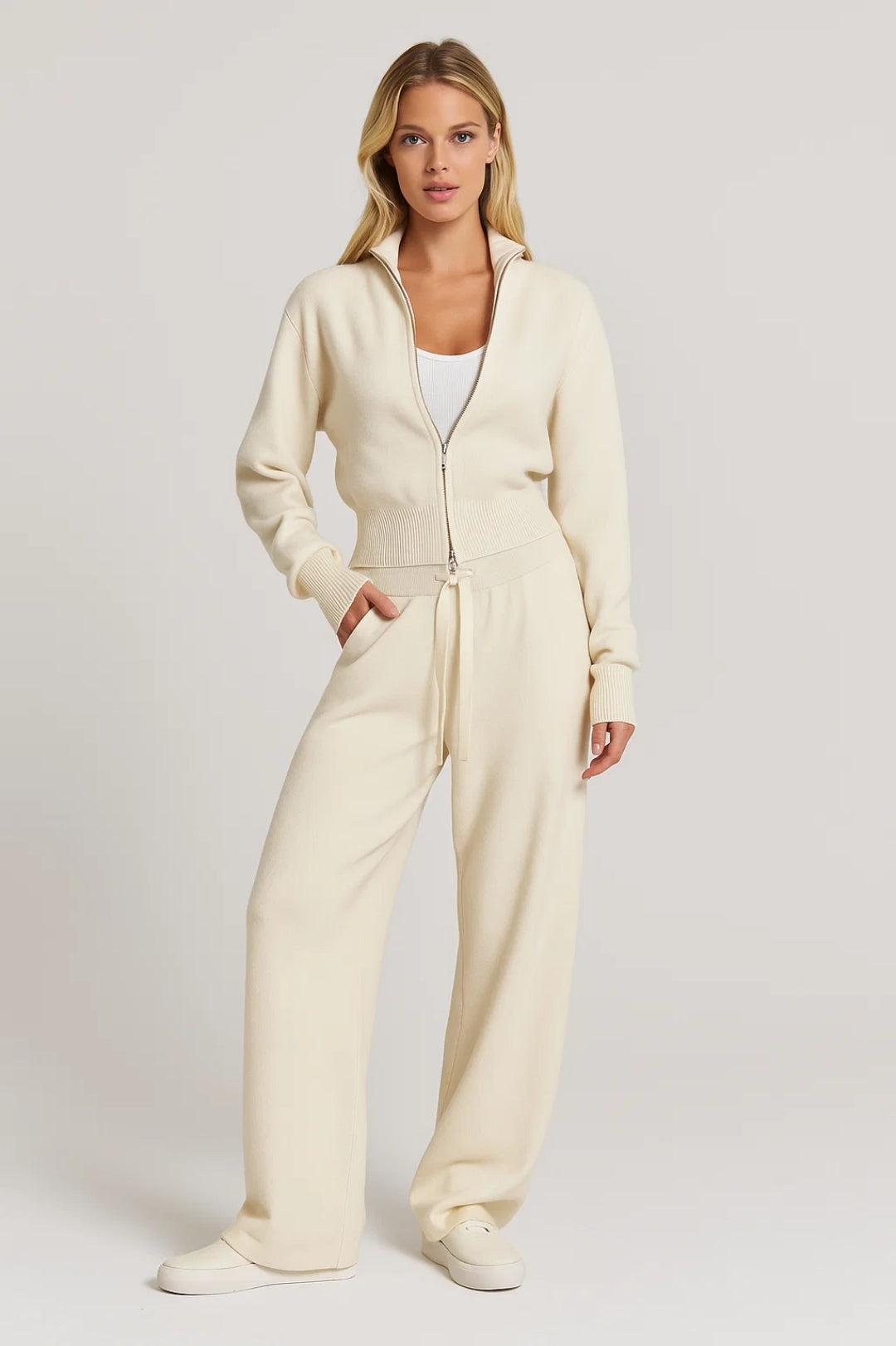 Completo due pezzi con zip e pantaloni larghi