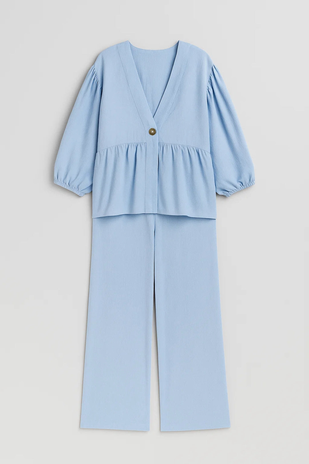 Completo con blusa ampia a maniche ballon e pantaloni larghi | Eleganza rilassata e moderna