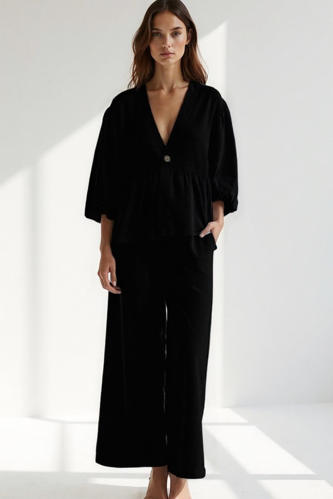 Completo con blusa ampia a maniche ballon e pantaloni larghi | Eleganza rilassata e moderna