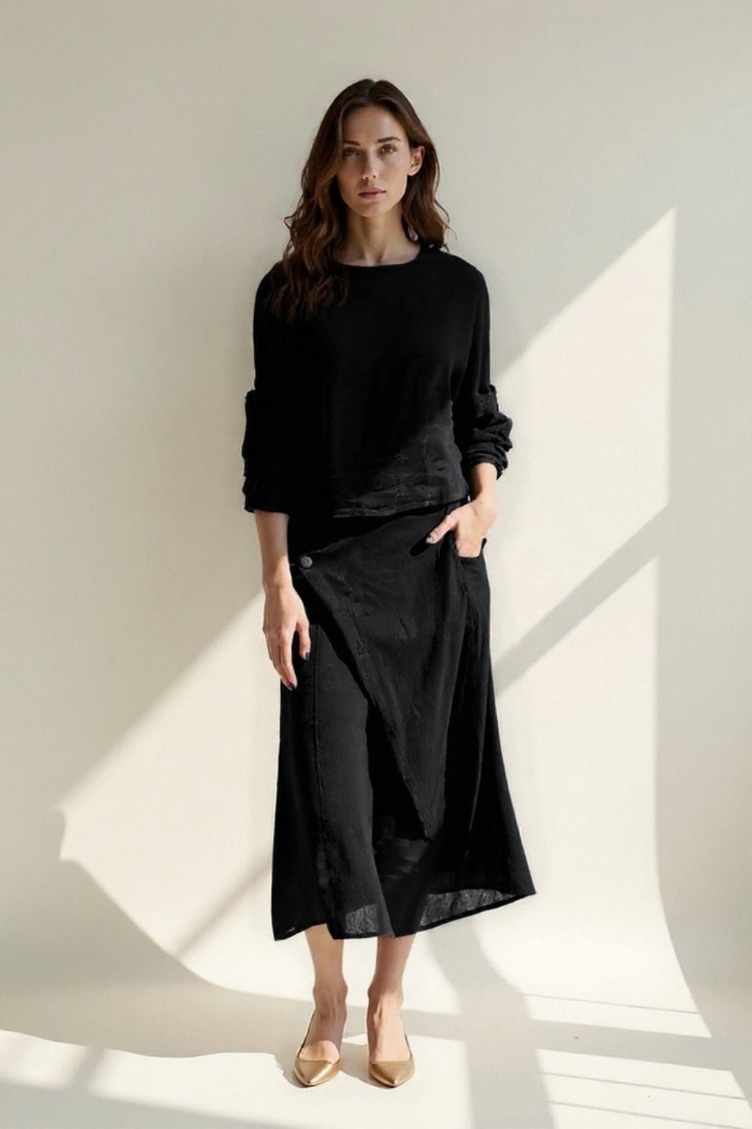 Completo con maglia a maniche lunghe e gonna midi asimmetrica | Eleganza semplice e naturale