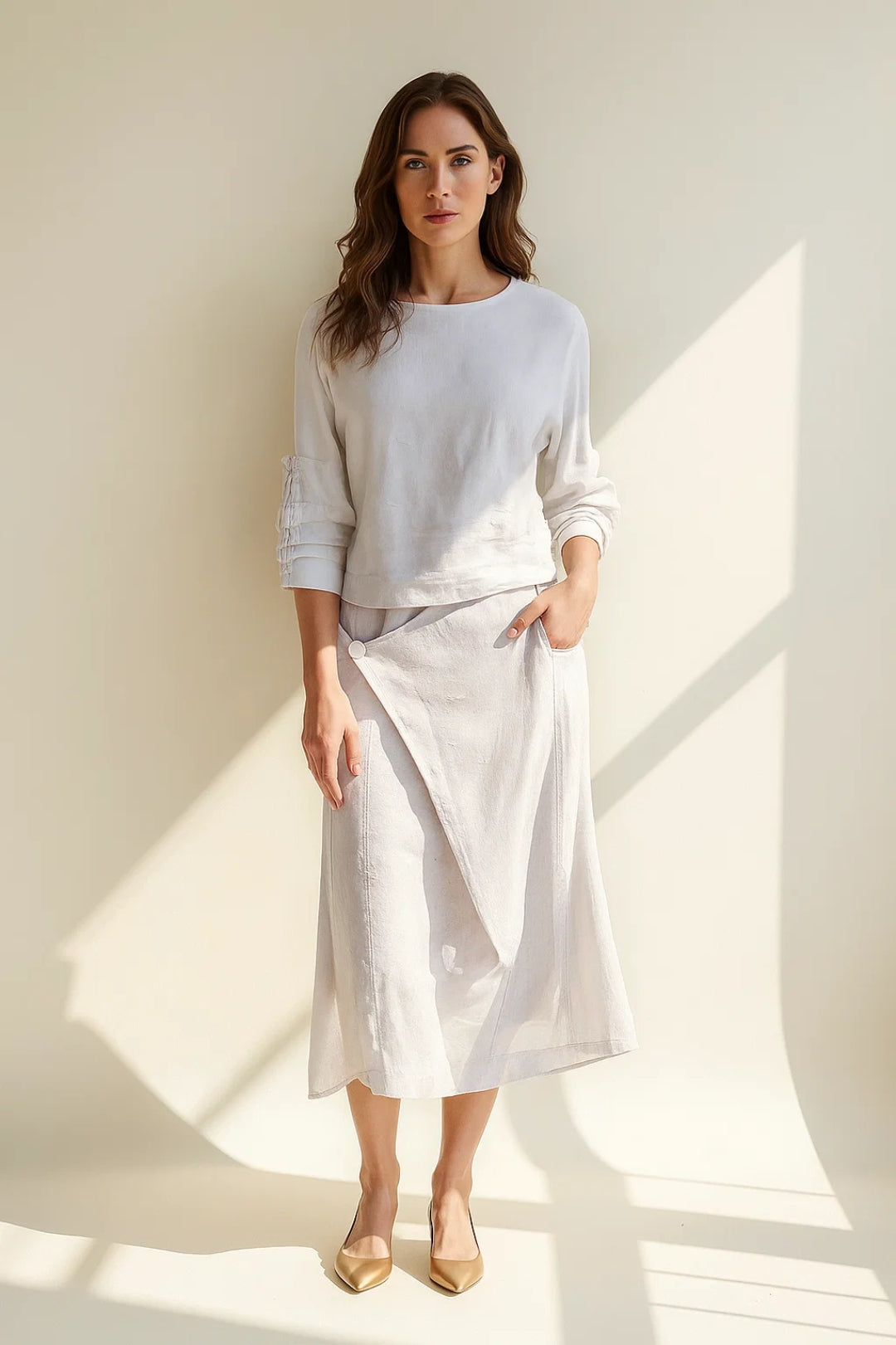 Completo con maglia a maniche lunghe e gonna midi asimmetrica | Eleganza semplice e naturale