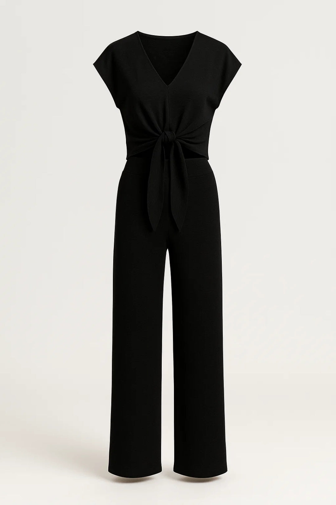 Completo due pezzi nero con top annodato e pantaloni a gamba larga | Stile elegante e moderno