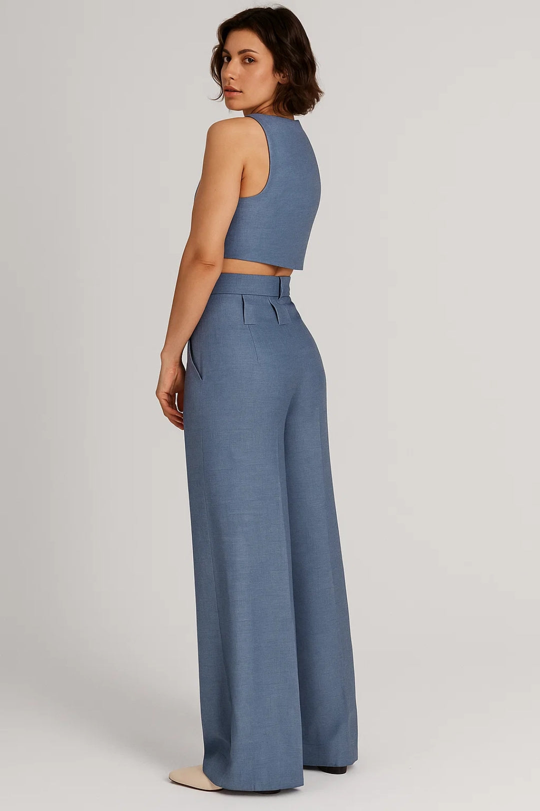 Completo elegante con top incrociato e pantaloni a vita alta | Blu ardesia