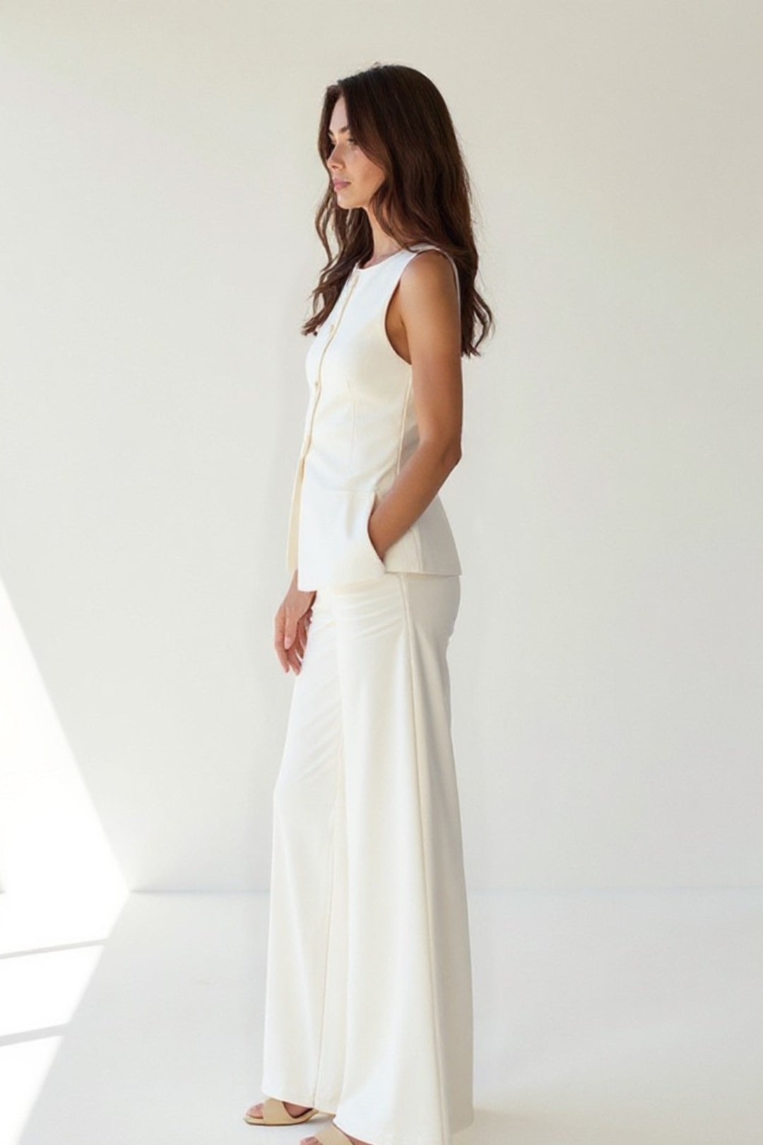 Completo elegante senza maniche con top e pantaloni a gamba larga | Bianco crema | Chic e raffinato