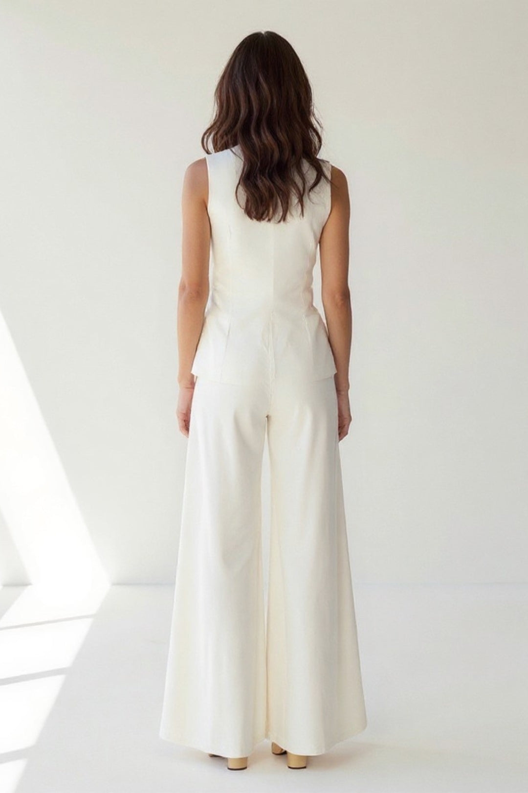 Completo elegante senza maniche con top e pantaloni a gamba larga | Bianco crema | Chic e raffinato