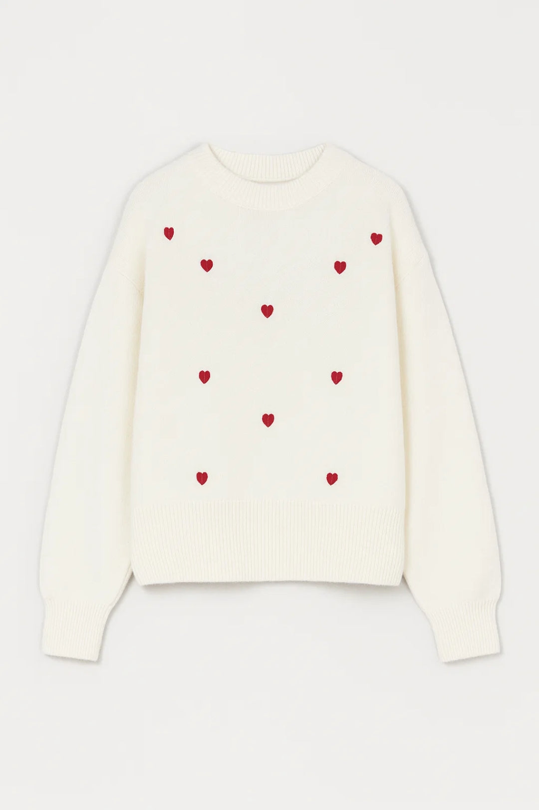 Maglione con piccoli cuori ricamati