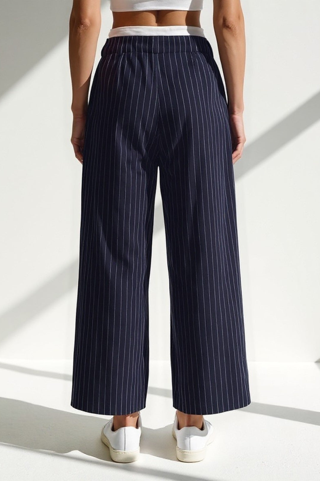 Pantaloni a righe verticali | Vita media | Gamba ampia e taglio dritto