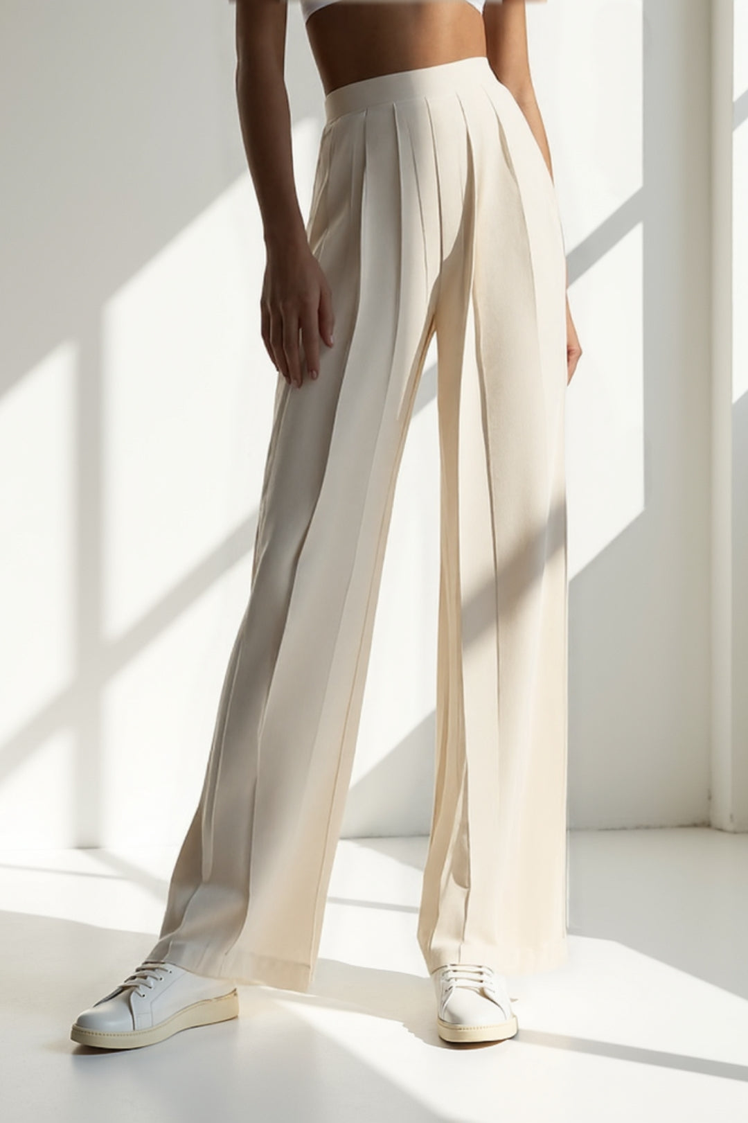 Pantaloni palazzo a pieghe verticali | Vita alta liscia | Eleganza minimalista