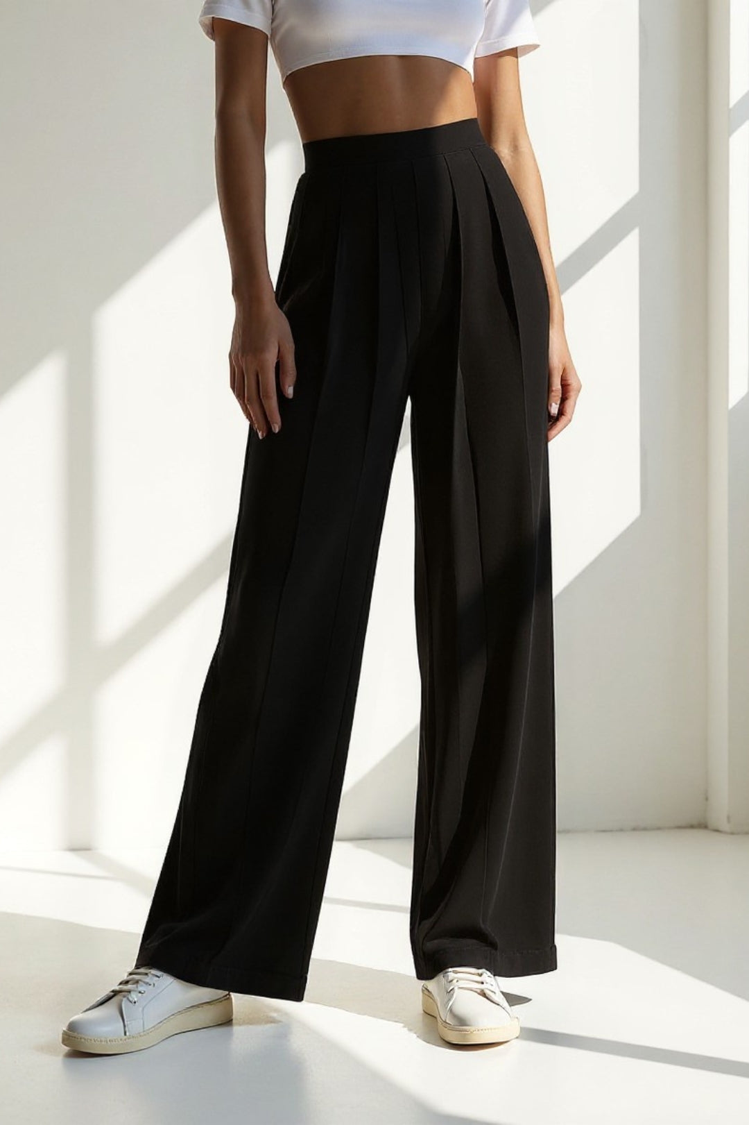 Pantaloni palazzo a pieghe verticali | Vita alta liscia | Eleganza minimalista