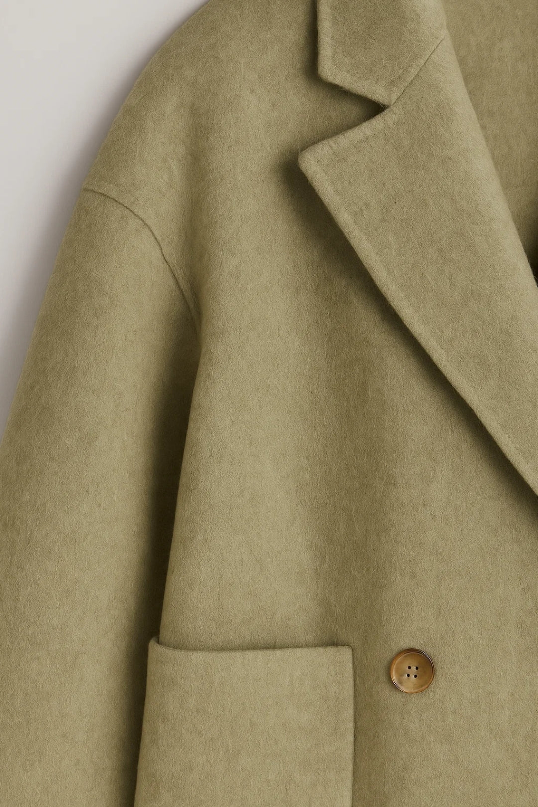 Cappotto oversize doppiopetto con tasche frontali