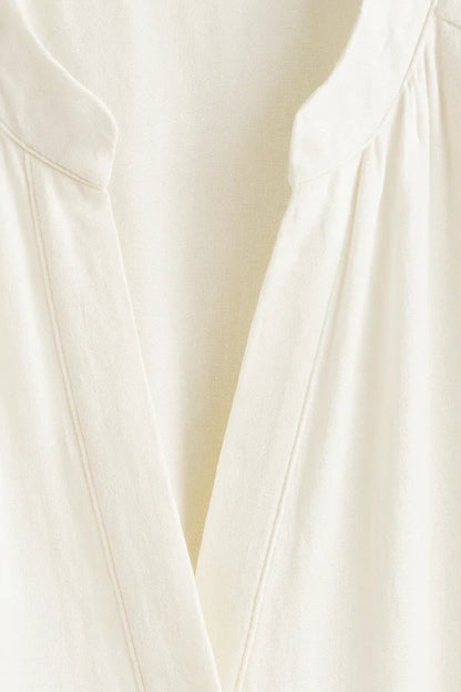 Abito camicia lungo con maniche arrotolate e chiusura a bottoni