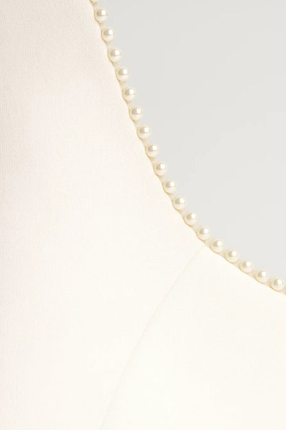 Abito lungo elegante con scollo decorato e fiocco posteriore | Stile sofisticato da cerimonia