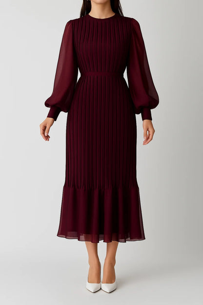 Abito lungo plissettato con maniche a palloncino | Elegante e fluido
