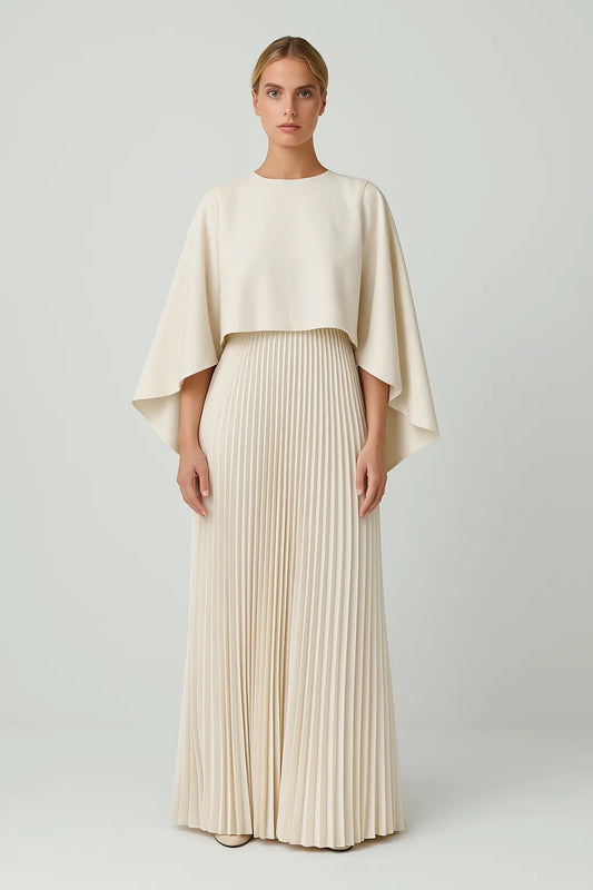 Abito lungo plissettato con mantella ampia
