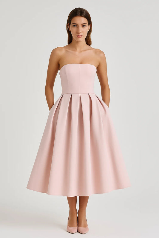 Abito midi elegante senza spalline con gonna a pieghe