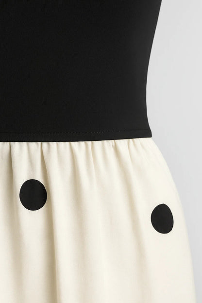 Abito midi senza spalline | Corpino nero e gonna a pois | Eleganza estiva