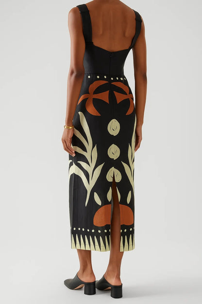 Abito midi stampato con cut-out frontale e spalline larghe