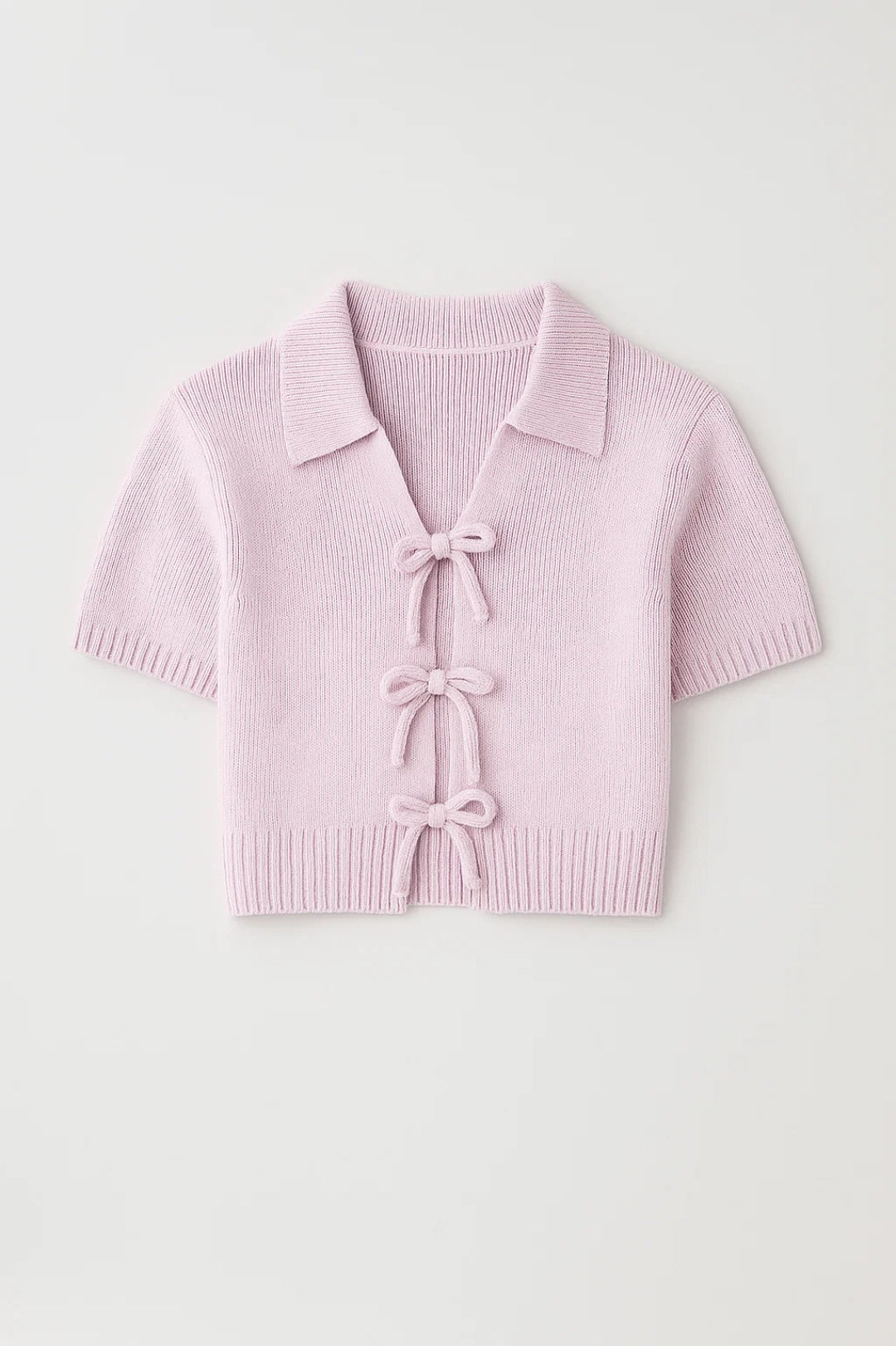 Cardigan corto con fiocchi decorativi