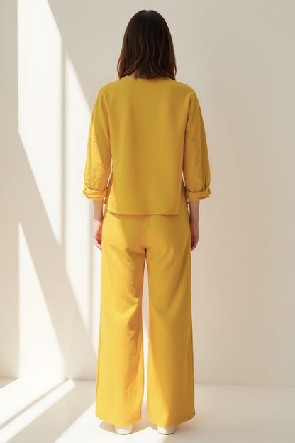 Completo due pezzi casual con pantaloni con bottoni laterali | Maglia a maniche lunghe e pantaloni larghi