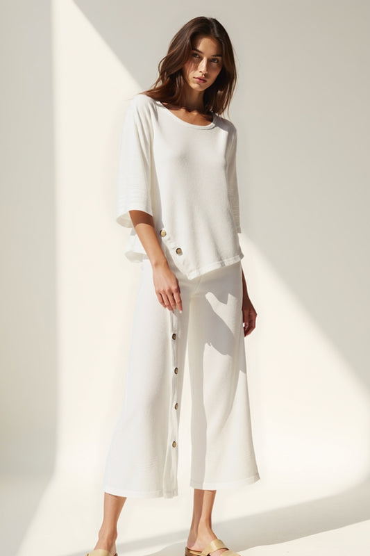 Completo due pezzi con bottoni decorativi | Maglia a maniche 3/4 e pantaloni culotte