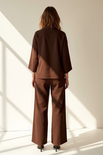 Completo con top a maniche larghe e pantaloni dritti | Stile minimal e sofisticato