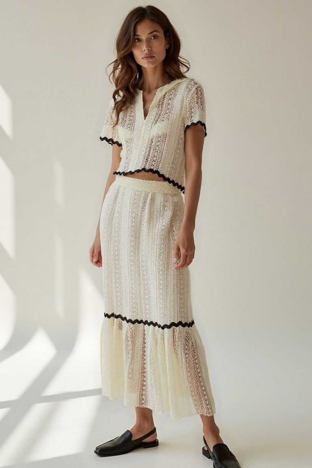 Completo due pezzi in pizzo con top e gonna lunga