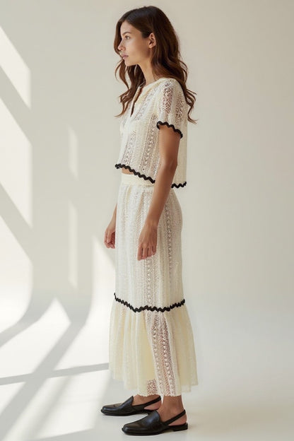 Completo due pezzi in pizzo con top e gonna lunga