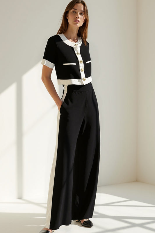 Completo elegante bicolore con giacca corta e pantaloni a gamba larga