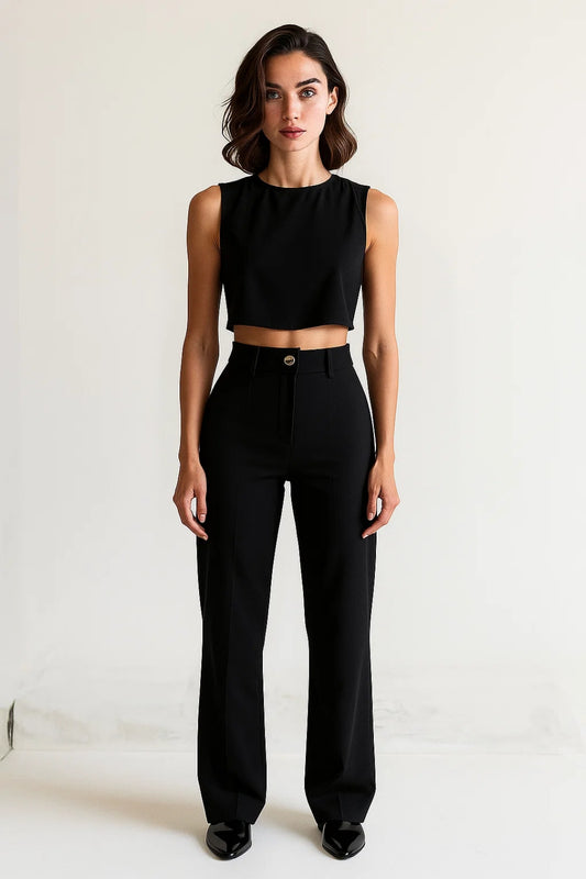 Completo elegante in due pezzi con top corto senza maniche e pantaloni a vita alta neri