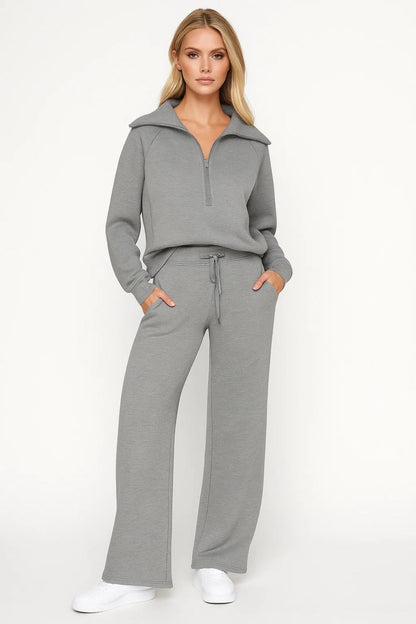 Completo loungewear con zip e pantaloni larghi