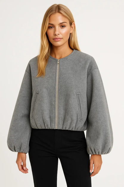 Giacca corta con zip e maniche a palloncino | Look moderno e pulito