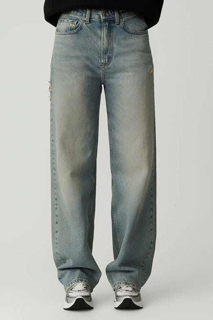 Jeans a gamba larga con effetto vissuto