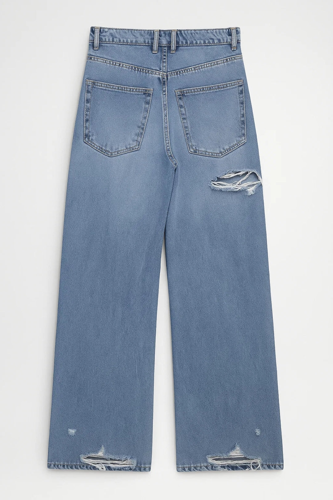 Jeans a gamba larga con strappi e vita alta