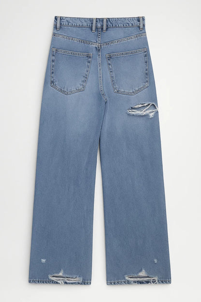 Jeans a gamba larga con strappi e vita alta