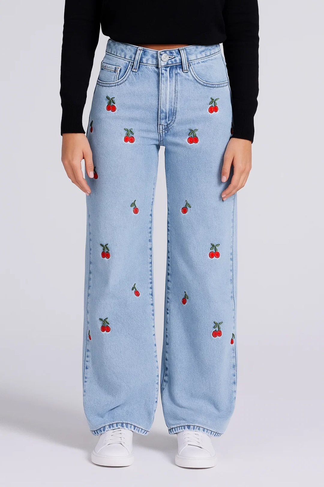 Jeans a gamba larga da donna con ricami decorativi | Stile giocoso e moderno