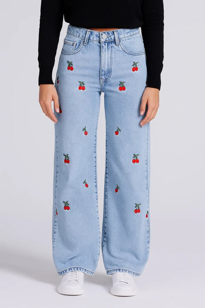 Jeans a gamba larga da donna con ricami decorativi | Stile giocoso e moderno