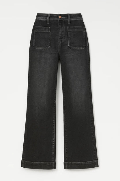 Jeans ampio con tasche frontali