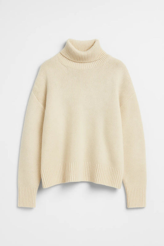 Maglione a collo alto con linea morbida e design minimalista