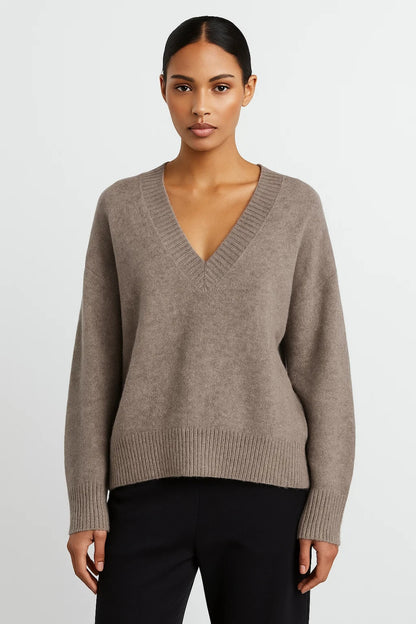 Maglione ampio con scollo a V e finiture a costine
