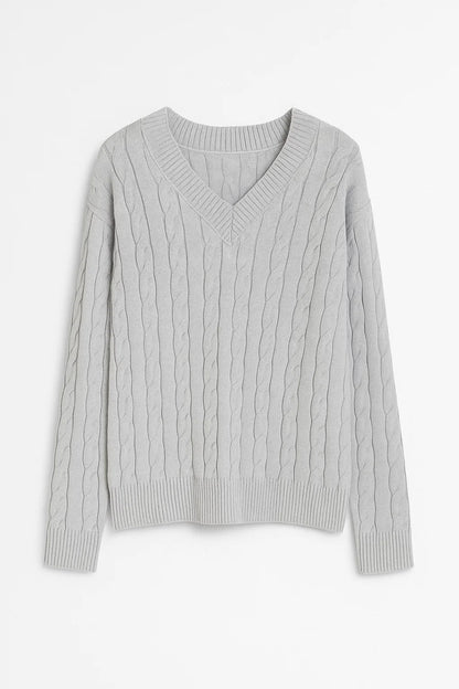 Maglione con scollo a V e lavorazione a trecce