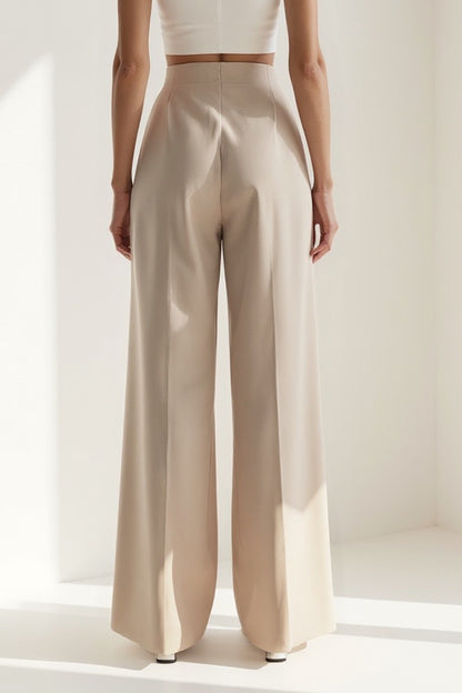 Pantalone a gamba larga in tessuto fluido | Vita alta | Chiusura con bottoni decorativi