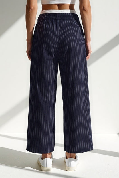 Pantaloni a righe verticali | Vita media | Gamba ampia e taglio dritto