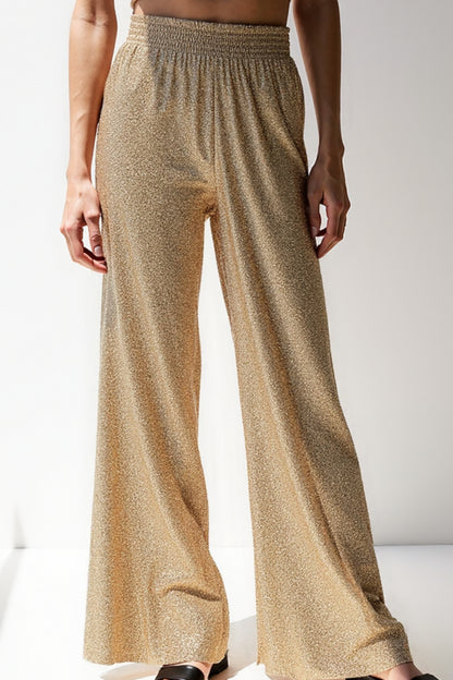 Pantaloni a zampa con glitter metallizzati | Vita alta elasticizzata | Look da sera scintillante