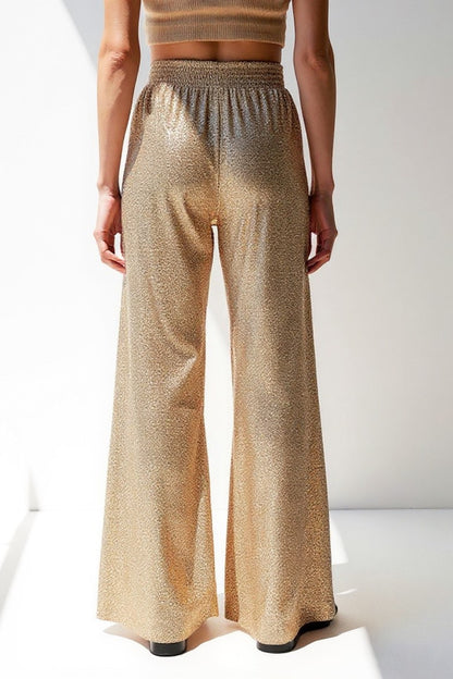 Pantaloni a zampa con glitter metallizzati | Vita alta elasticizzata | Look da sera scintillante